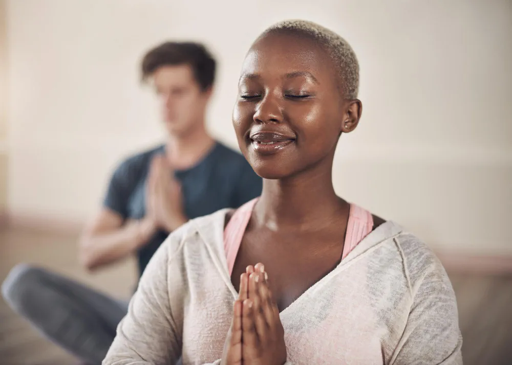 Woman practicing mindfulness and meditation